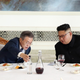 South Korean President Moon Jae-in talks with North Korean dictator Kim Jong Un during a lunch at the Okryugwan restaurant on September 19, 2018 in Pyongyang, North Korea